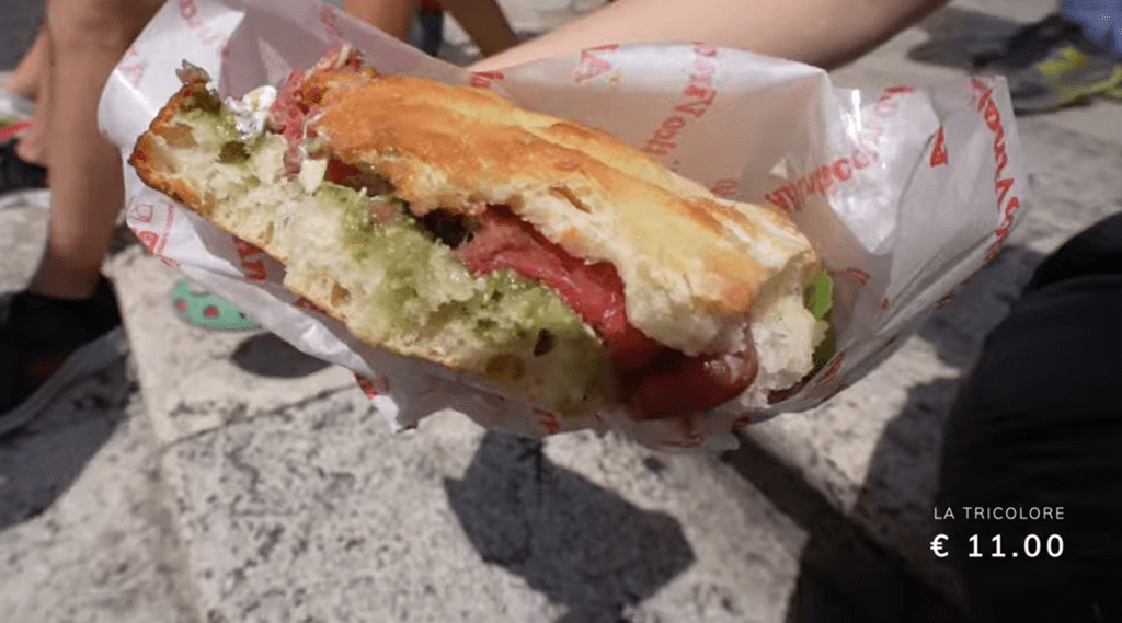 La Tricolore, thin-cut beef sandwich smothered in pistachio cream sauce